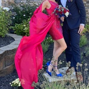 Gorgeous red one shoulder sherri hill dress with attached cape